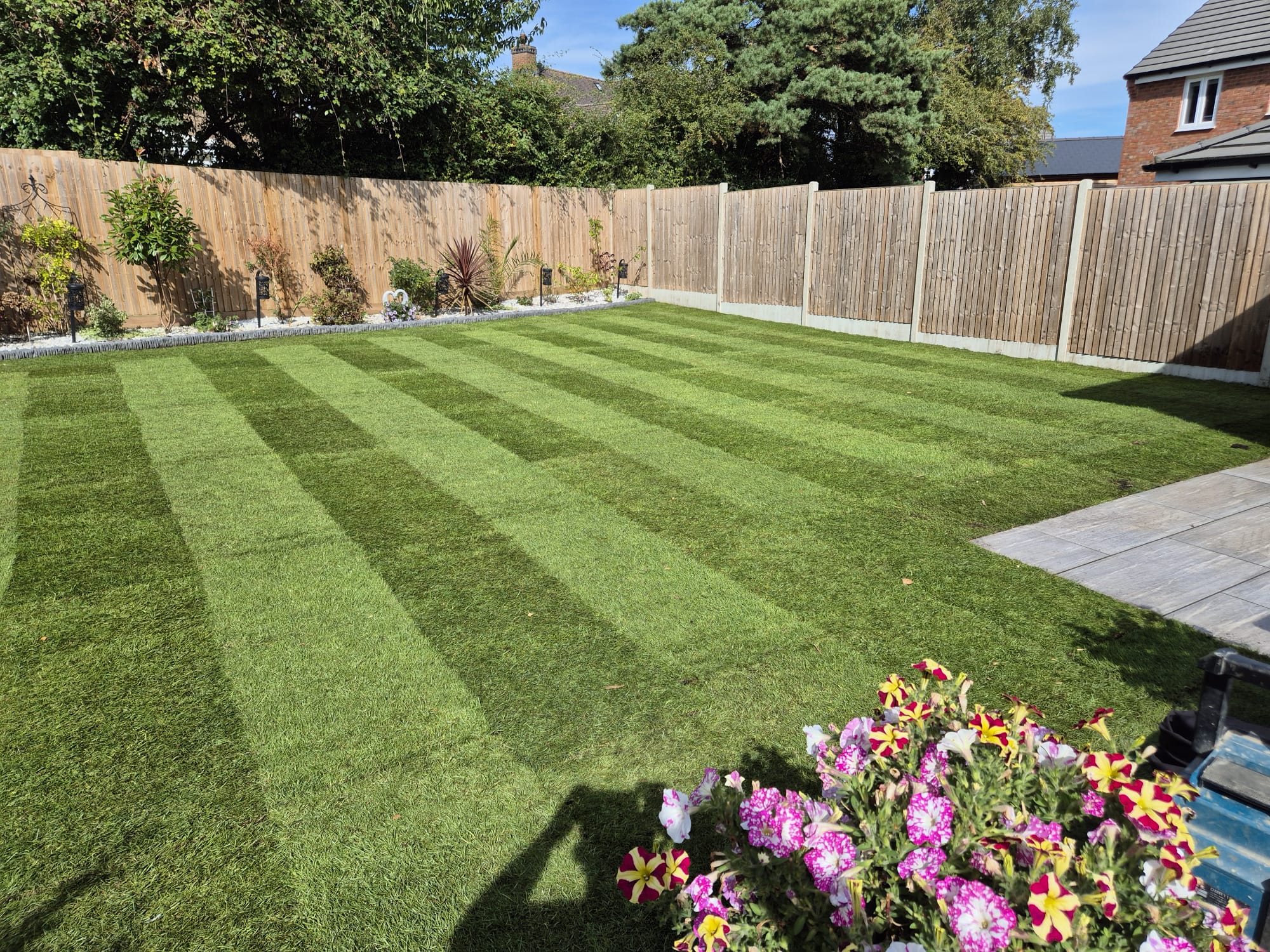 Finished landscaping project by Boyde Landscapes photographed at dusk.